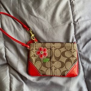 Coach Wristlet with Red Flower Pattern